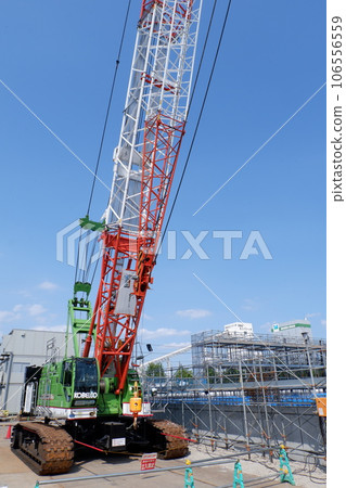 Crawler crane at construction site 106556559