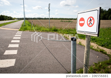 Ban on entry road sign for pedestrians and cars 106556881