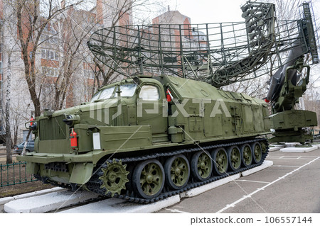 Radar antenna on a green all-terrain vehicle. Radar antenna on a green all-terrain vehicle. 106557144