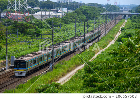 Chiba New Town Railway Series 9800 train running through greenery from Shiroi to Komurokan Chiba New Town Railway Series 9800 train running through greenery from Shiroi to Komurokan 106557508