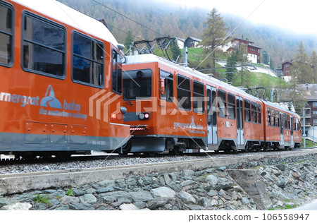 Gornergrat Railway (GGB, Switzerland): First train leaving Zermatt in the early morning 106558947
