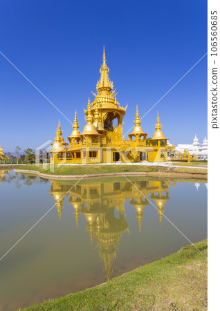 The Gold pagoda in Wat Rong Khun or White Temple, Landmark, Chiang Rai, Thailand. 106560685
