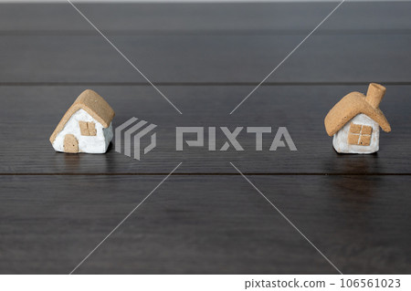 Two small cute houses made of ceramics Two small cute houses made of ceramics 106561023