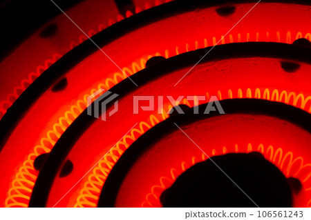 Electric heating wire (coil nichrome wire) heated red 106561243