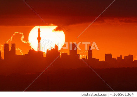 "Tokyo" Dawn of Tokyo, the sun rising from the skyscraper 106561364