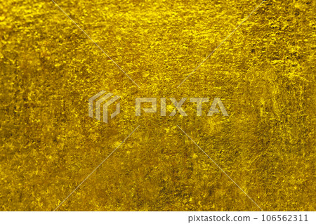 Rough golden surface texture that resembles an ancient treasure Rough golden surface texture that resembles an ancient treasure 106562311
