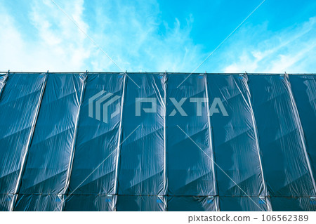 Building under repair Sunlight illuminating the curing curtain b-3 Light color 106562389