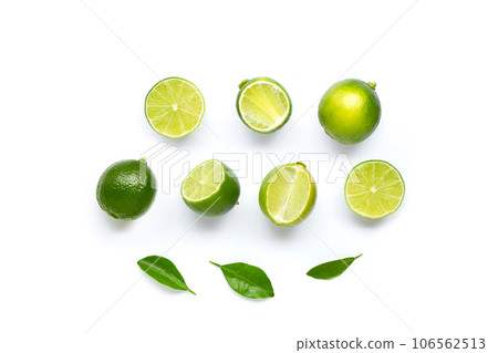 Limes with leaves isolated on white background. Limes with leaves isolated on white background. 106562513