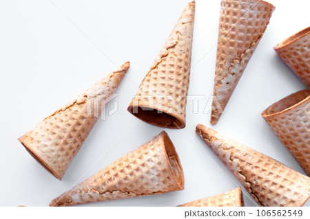 Empty ice cream cones on white background. 106562549