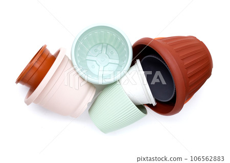Plastic plant pots, containers on white background. 106562883