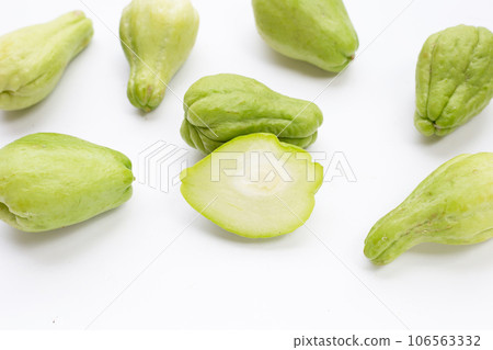 Fresh chayote fruit on white background. Fresh chayote fruit on white background. 106563332