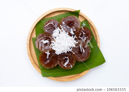 Thai dessert brown sugar (Ko sui) with grated coconut Thai dessert brown sugar (Ko sui) with grated coconut 106563335