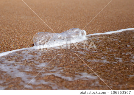 Plastic bottle on the beach Plastic bottle on the beach 106563567