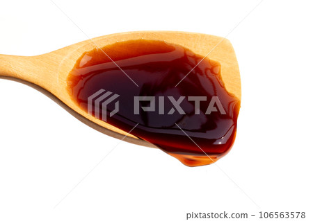 Oyster sauce on white background. Oyster sauce on white background. 106563578