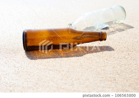 Glass bottles on the beach Glass bottles on the beach 106563800