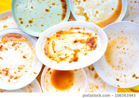 Dirty dishes on yellow background. Top view 106563943
