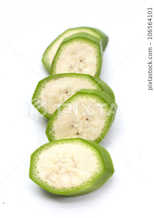 Raw banana slices on white background. 106564101