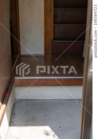 Entrance part of an old house 106564723