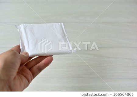 hand over sanitary napkin hand over sanitary napkin 106564865