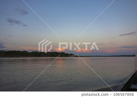 Sunset over the lake 106567808