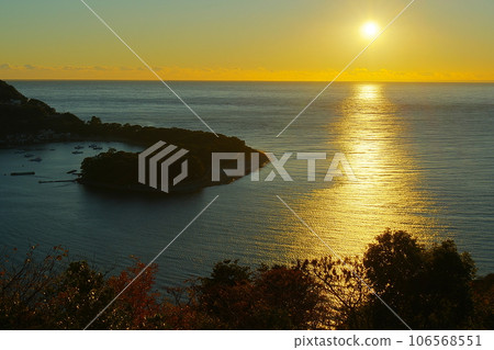 Scenery of ocean, harbor and gently curving cape shining golden in the setting sun Ver3 Scenery of ocean, harbor and gently curving cape shining golden in the setting sun Ver3 106568551