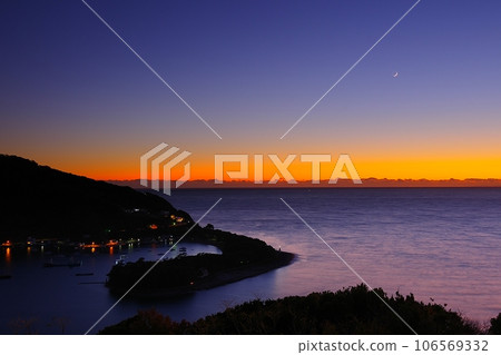 Scenery of Izu Peninsula Toda Port and Cape Mihama with the afterglow sky and crescent moon in the background Ver1 Scenery of Izu Peninsula Toda Port and Cape Mihama with the afterglow sky and crescent moon in the background Ver1 106569332