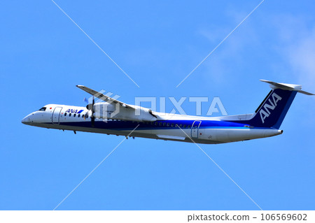 Osaka International Airport Passenger plane Bombardier takeoff Inagawa embankment Osaka International Airport Passenger plane Bombardier takeoff Inagawa embankment 106569602