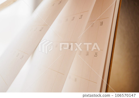 Calendar page flipping sheet close up blur background business schedule planning appointment meeting concept Calendar page flipping sheet close up blur background business schedule planning appointment meeting concept 106570147