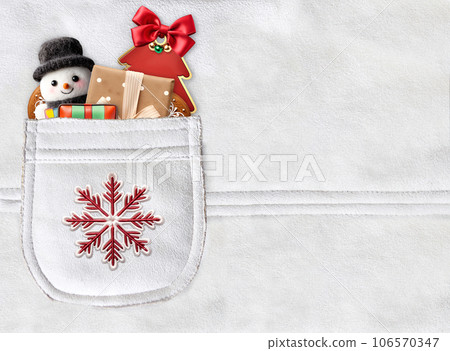 Horizontal Christmas backdrop with gifts in pocket on suede texture of ivory color. Xmas background with toys and gift box in suede pocket of light beige color 106570347