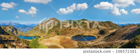 Autumn alpine Paarsee or Paarseen lakes, Land Salzburg, Austria. Alps Hochkonig rocky mountain group view in far. Autumn alpine Paarsee or Paarseen lakes, Land Salzburg, Austria. Alps Hochkonig rocky mountain group view in far. 106572381