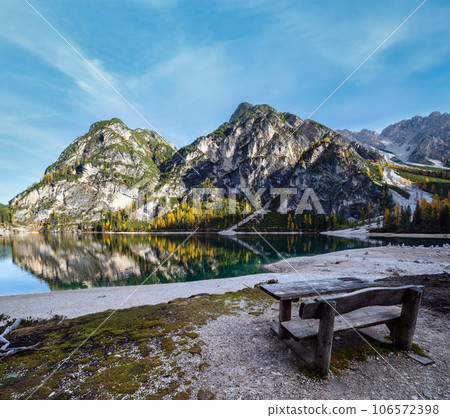 Autumn peaceful alpine lake Braies or Pragser Wildsee. Fanes-Sennes-Prags national park, South Tyrol, Dolomites Alps, Italy, Europe. Picturesque traveling, seasonal and nature beauty concept scene. 106572398