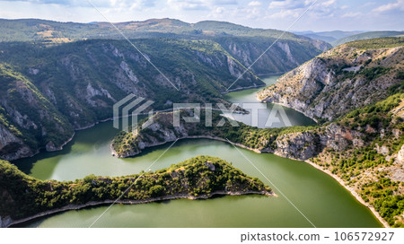 Aerial view to viewpoint Vidikovac Molitva, with curved meanders in canyon of Uvac river, Serbia Aerial view to viewpoint Vidikovac Molitva, with curved meanders in canyon of Uvac river, Serbia 106572927
