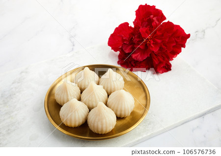 Steamed or ukdiche Modak. Offered to Lord Ganesha during Ganpati festival in India. 106576736