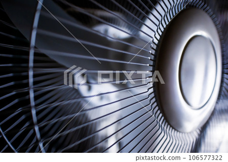 White electric domestic fan, closeup macro view 106577322