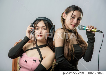 young beautiful asian woman with headphones young beautiful asian woman with headphones 106577866