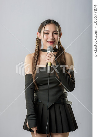 young beautiful asian woman with headphones young beautiful asian woman with headphones 106577874