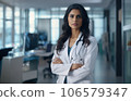 Female indian doctor portrait against medical clinic 106579347