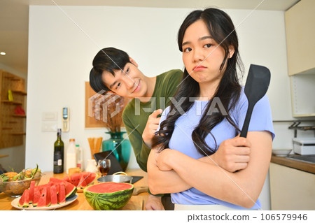 Caring young asian man making peace and reconcile with lover, asking forgiveness after quarrel. Married problems concept 106579946