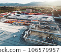 Sun is shining over a large logistic center building in the countryside  106579957