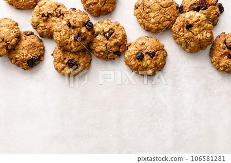 Oatmeal cranberry healthy homemade cookies with cinnamon and pecan nuts for breakfast Oatmeal cranberry healthy homemade cookies with cinnamon and pecan nuts for breakfast 106581281