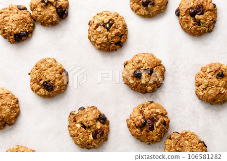Oatmeal cranberry healthy homemade cookies with cinnamon and pecan nuts for breakfast 106581282