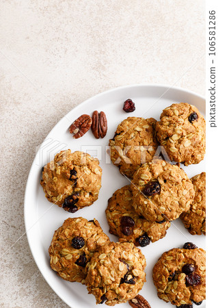 Oatmeal cranberry healthy homemade cookies with cinnamon and pecan nuts for breakfast 106581286