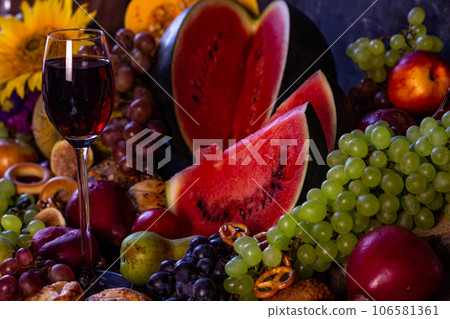Still life of watermelon and fruit, autumn, Harvest Festival or Thanksgiving 106581361
