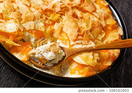 creamy cheesy chicken almond casserole, top view creamy cheesy chicken almond casserole, top view 106581603