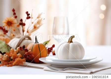 Festive autumn table setting for Thanksgiving with decorations made of natural plants Festive autumn table setting for Thanksgiving with decorations made of natural plants 106581814