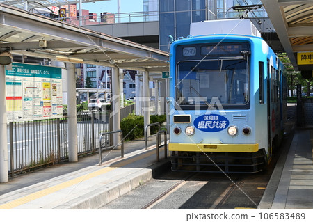 Toyohashi Railway Higashida Main Line tram platform at the stop in front of the station Toyohashi Railway Higashida Main Line tram platform at the stop in front of the station 106583489
