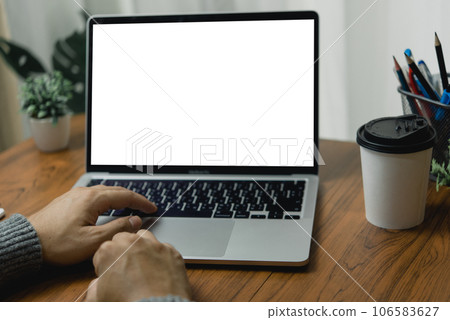 mock up Using laptop with blank screen computer modern. Copy space marketing and creative design mock up Using laptop with blank screen computer modern. Copy space marketing and creative design 106583627