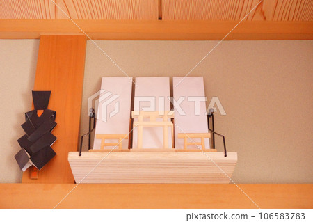 Substitute for a Shinto altar 11 bills placed on the wall shelf Substitute for a Shinto altar 11 bills placed on the wall shelf 106583783
