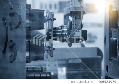 The box container part gripping by vacuum robotic system from injection machine. The box container part gripping by vacuum robotic system from injection machine. 106583979