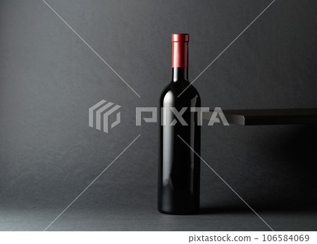 An unopened bottle of red wine. An unopened bottle of red wine. 106584069